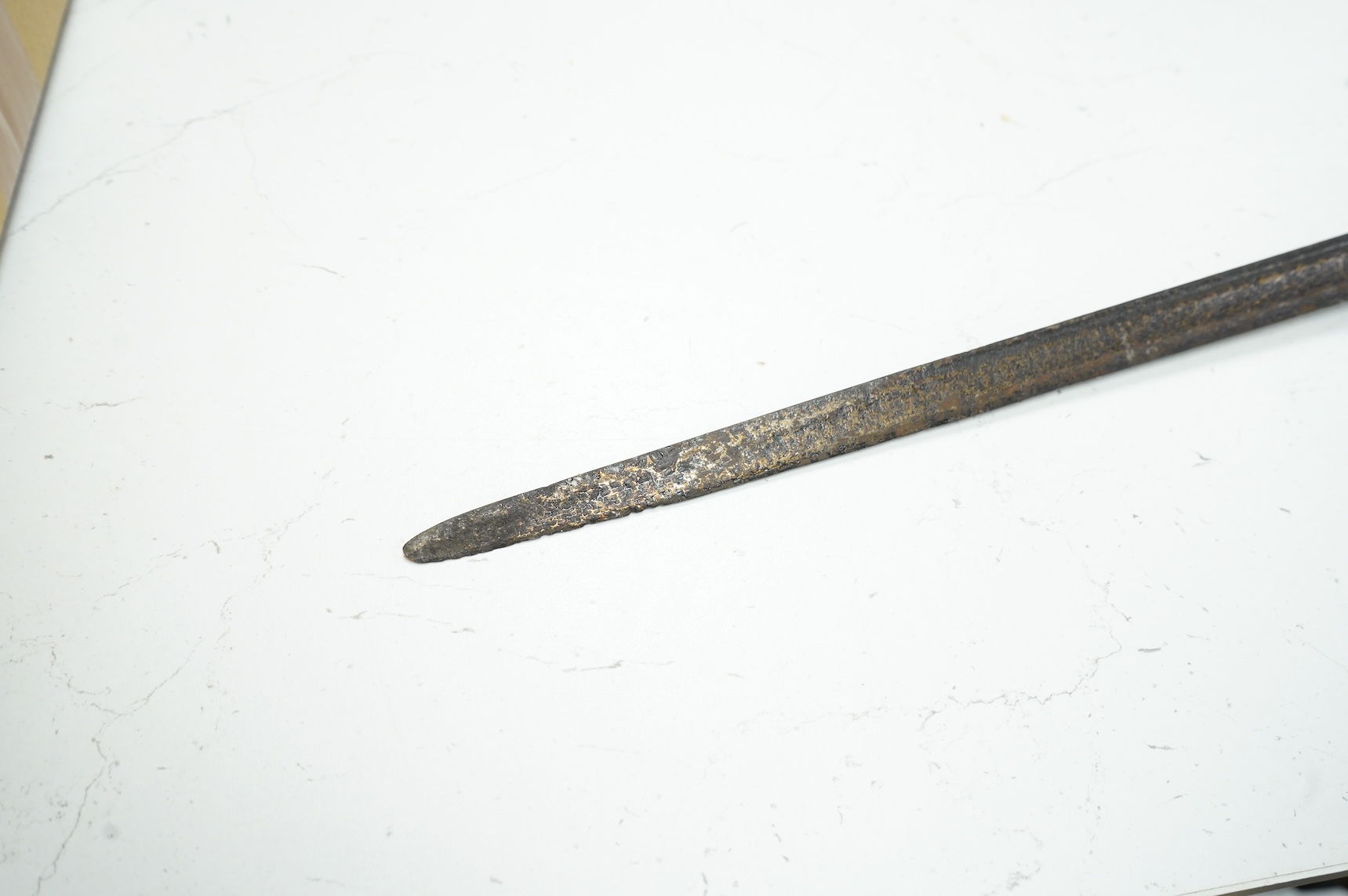 A basket hilted backsword of c.1750, with single edge blade cut with a pair of fullers, three-quarter basket guard comprising many rectangular openings, blade 90.5cm